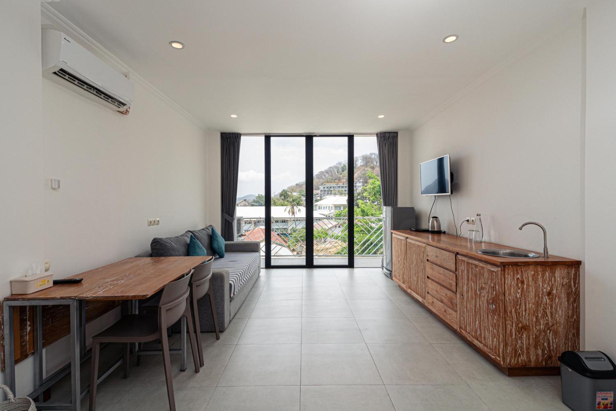 Komodo Suites Downtown Managed By Cpm Bali Labuan Bajo Zewnętrze zdjęcie