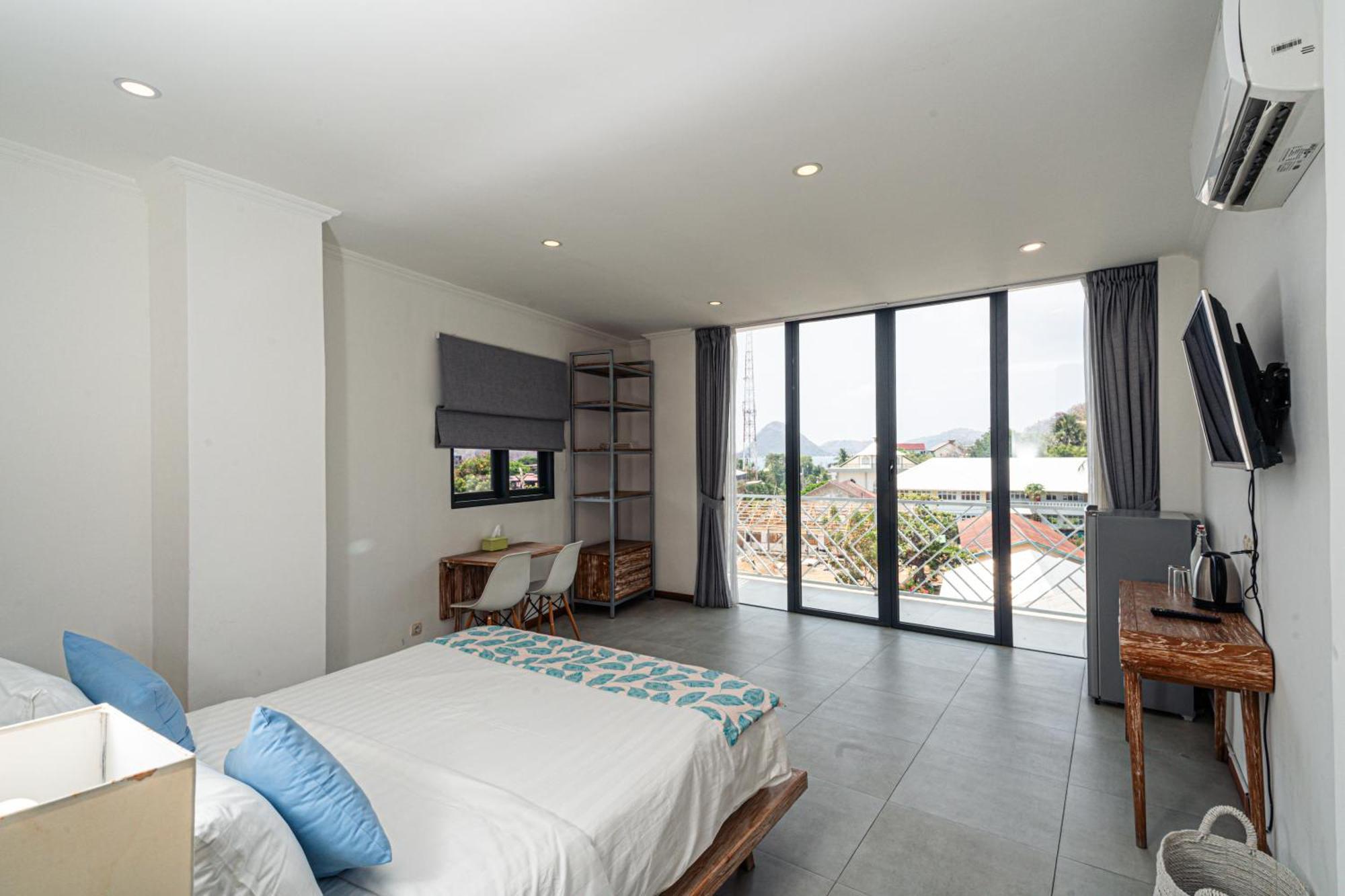 Komodo Suites Downtown Managed By Cpm Bali Labuan Bajo Zewnętrze zdjęcie